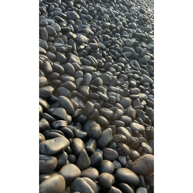 smooth-black-river-stones-wet.jpg